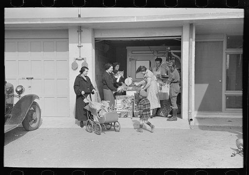 Untitled photo, possibly related to: Consumer's cooperative. The homesteaders have their own kosher meat shop and grocery, which they expect to enlarge as the colony grows. This picture shows manager, Nathan Dubin, doing a flourishing business in his temporary store. Jersey Homesteads, Hightstown, N