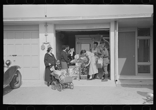 Untitled photo, possibly related to: Consumer's cooperative. The homesteaders have their own kosher meat shop and grocery, which they expect to enlarge as the colony grows. This picture shows manager, Nathan Dubin, doing a flourishing business in his temporary store. Jersey Homesteads, Hightstown, N