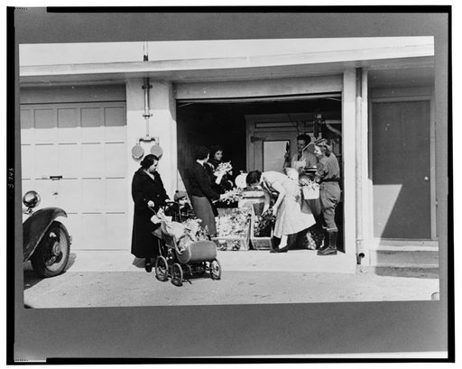 Consumer's cooperative. The homesteaders have their own kosher meat shop and grocery, which they expect to enlarge as the colony grows. This picture shows manager, Nathan Dubin, doing a flourishing business in his temporary store. Jersey Homesteads, Hightstown, New Jersey