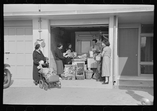 Untitled photo, possibly related to: Consumer's cooperative. The homesteaders have their own kosher meat shop and grocery, which they expect to enlarge as the colony grows. This picture shows manager, Nathan Dubin, doing a flourishing business in his temporary store. Jersey Homesteads, Hightstown, N