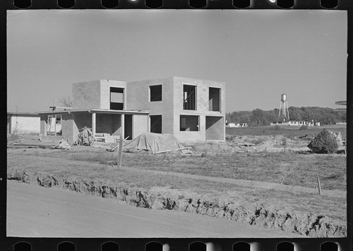 Untitled photo, possibly related to: Men working on roof of house under construction, Jersey Homesteads, Hightstown, New Jersey