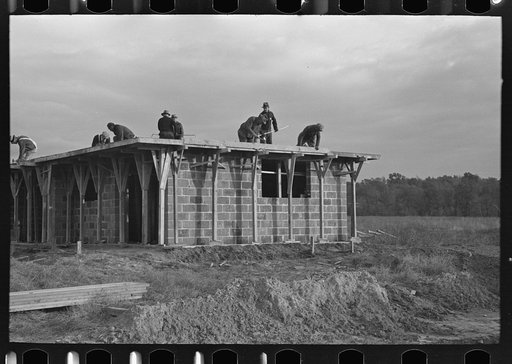 Men working on roof of house under construction, Jersey Homesteads, Hightstown, New Jersey