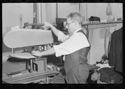 Proprietor of tailor shop at steam presser, University Place near 11th Street, New York City