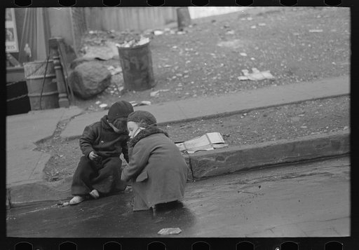 Children playing in the gutter on 139th Street just east of St. Anne's Avenue, Bronx, New York