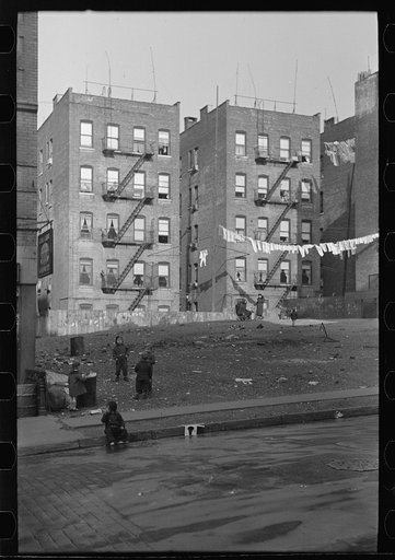 Untitled photo, possibly related to: Apartment houses as viewed through vacant lot. In vicinity of 139th Street just east of St. Anne's Avenue Bronx, New York