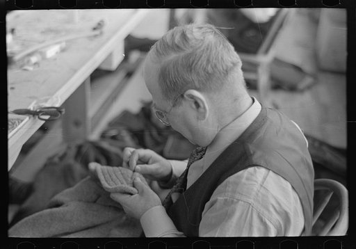 Closeup of tailor in garment factory, Jersey Homesteads, Hightstown, New Jersey