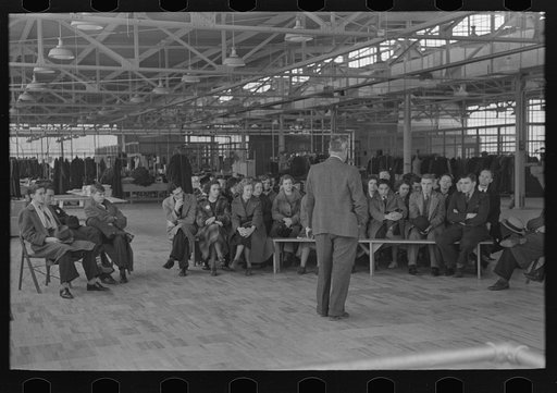 Untitled photo, possibly related to: Director of information, Jersey Homesteads, speaking to visitors of the factory, Hightstown, New Jersey