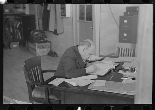 Comptroller of factory at Jersey Homesteads at work in office, Hightstown, New Jersey