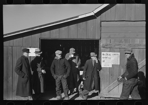 Farmers on front of lunch shed, country auction, Aledo, Illinois
