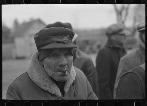 A farmer at a country auction near Aledo, Mercer County, Illinois