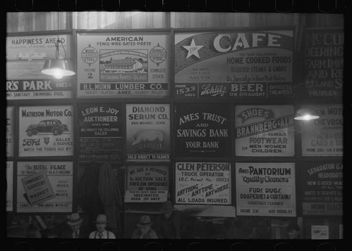 Untitled photo, possibly related to: Advertising displays at livestock hall, Ames, Iowa