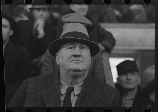 Untitled photo, possibly related to: Closeup of farmer, spectator livestock sales hall, Ames, Iowa