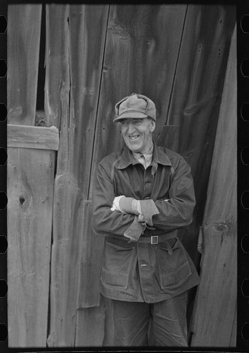 Untitled photo, possibly related to: W.H. Cox, owner-operator of 124-acre farm, Clearcreek Township, Johnson County, Iowa. Only 60 acres of the farm are tillable