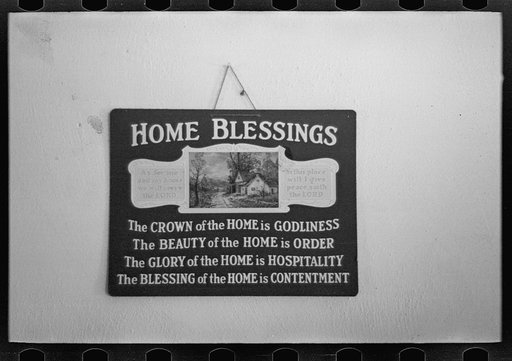 Sign in J.E. Herbrandson's farmhouse near Estherville, Iowa