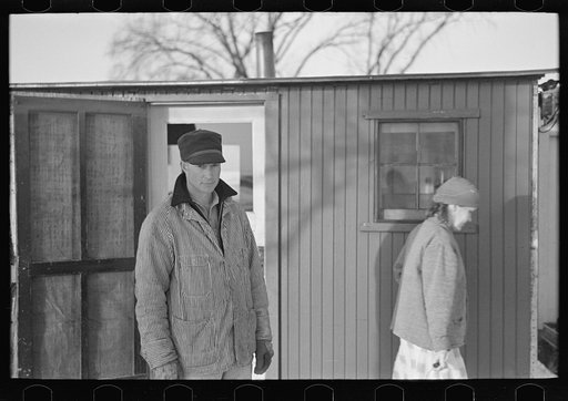 Untitled photo, possibly related to: Mr. and Mrs. Marcus Miller and dog, Spencer, Iowa