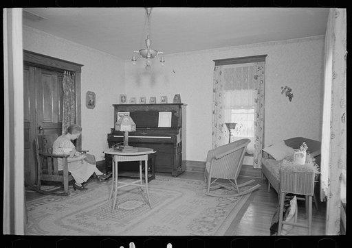 Untitled photo, possibly related to: Living room of Levi Mills farmhouse near Spencer, Iowa. This eighty acre farm is rented from a retired farmer