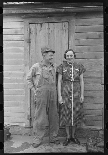Untitled photo, possibly related to: Mr. and Mrs. Roy Merriott on rented farm of 160 acres near Estherville, Iowa. Until recently owned by loan company; it has been sold to a private party. It is the third farm Merriott has lost in the past ten years