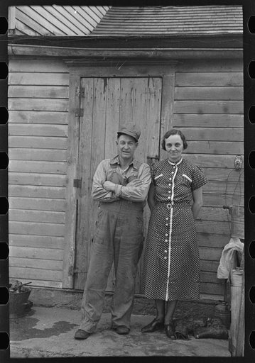Untitled photo, possibly related to: Mr. and Mrs. Roy Merriott on rented farm of 160 acres near Estherville, Iowa. Until recently owned by loan company; it has been sold to a private party. It is the third farm Merriott has lost in the past ten years