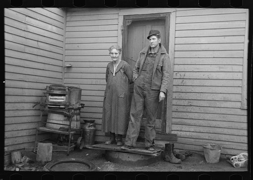 Mrs. Mary Kelsheimer and one of her sons on a tenant farm in Miller Township, Woodbury County, Iowa