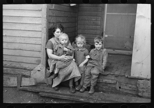 Mrs. Theodore Eickholt and her three children, Miller Township, Woodbury County, Iowa