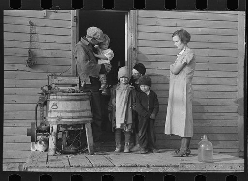 Family of Glen Cook, who rents his farm from a loan company. Cook's livestock has been cut down considerably due to lack of feed. Little Sioux township, Woodbury County, Iowa
