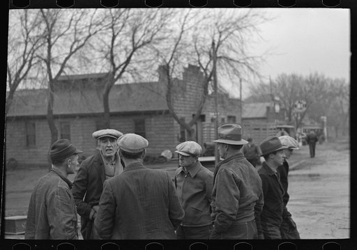 Group of farmers on sale day, Mapleton, Iowa