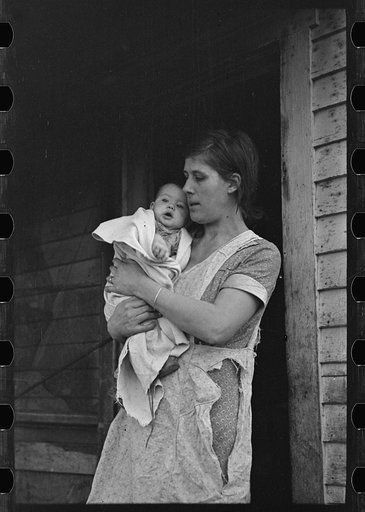 Untitled photo, possibly related to: Mrs. Atkinson and baby. Atkinson rents from an estate and has eighty acres of very poor land on which to support his family of nine. Mrs. Atkinson walked fifteen miles to the relief office to get aid for the family, near Shannon City, Ringgold County, Iowa