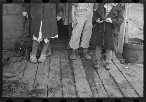 Children's shoes and clothes, Alfred Atkinson family near Shannon City, Ringgold County, Iowa