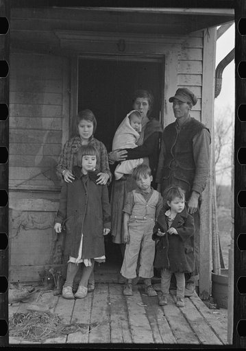Untitled photo, possibly related to: Children's shoes and clothes, Alfred Atkinson family near Shannon City, Ringgold County, Iowa