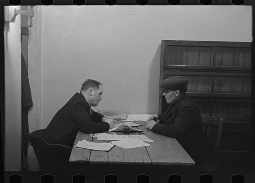 Farmer applying for feed loan, resettlement office, Sioux City, Iowa