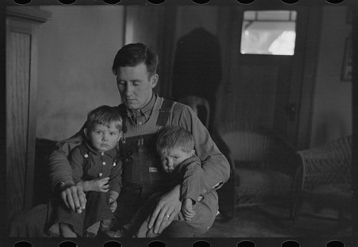 J. Donnell Champion and his two children who received a start from resettlement two years ago. He has applied for a resettlement grant for feed to get his livestock through the winter