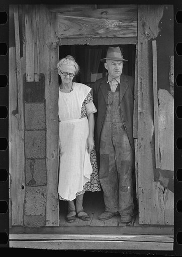 Mr. and Mrs. John Landers, tenant farmers, at the backdoor of their farmhouse, near Marseilles, Illinois
