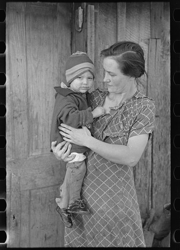Mrs. John Scott, wife of a hired man and one of her six children, near Ringgold, Iowa