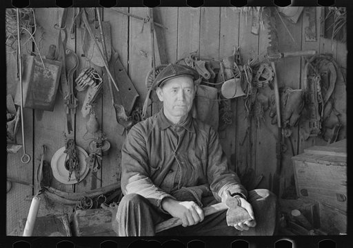 Untitled photo, possibly related to: A farmer in his toolhouse, near McLeansboro, Illinois