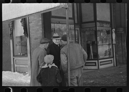 Untitled photo, possibly related to: A group of flood refugees on the streets of McLeansboro, Illinois