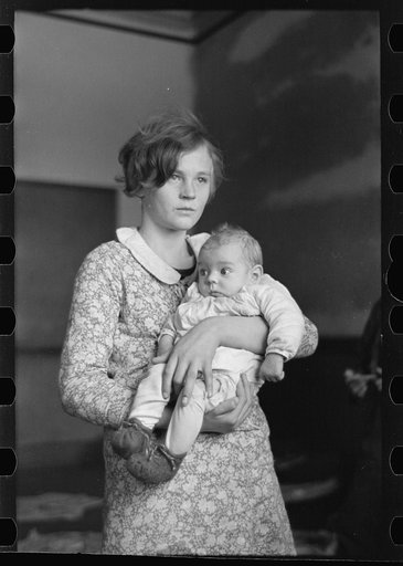 Untitled photo, possibly related to: Woman and child, flood refugees in schoolhouse, Sikeston, Missouri