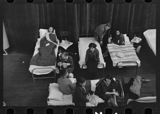 Untitled photo, possibly related to: Visiting day in an improvised hospital for flood refugees at Sikeston, Missouri