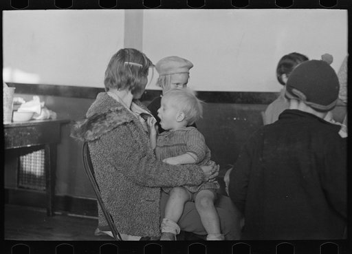 Untitled photo, possibly related to: Mother and child, flood refugees in a schoolhouse at Sikeston, Missouri