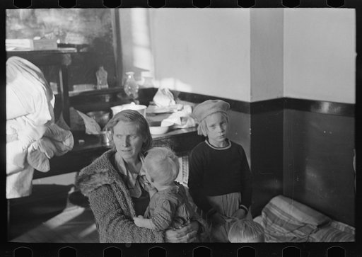Untitled photo, possibly related to: Mother and child, flood refugees in a schoolhouse at Sikeston, Missouri