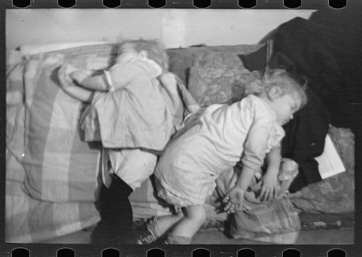 Untitled photo, possibly related to: Exhausted flood refugee resting, Sikeston, Missouri