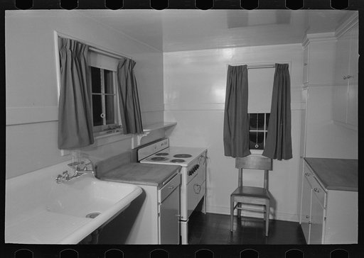 Sink, refrigerator and stove in the kitchen of the model house at Greendale, Wisconsin