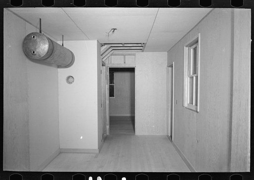 Untitled photo, possibly related to: Bedroom in the model house at Greendale, Wisconsin