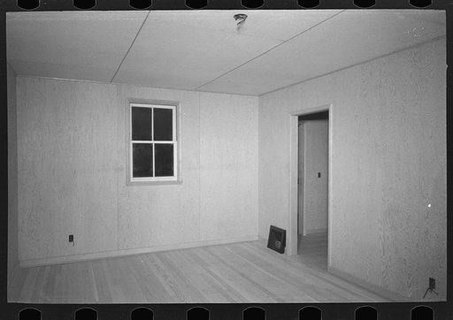 Untitled photo, possibly related to: Bedroom in the model house at Greendale, Wisconsin