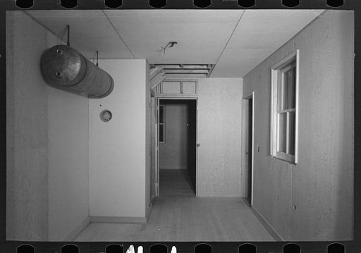 Untitled photo, possibly related to: Bedroom in the model house at Greendale, Wisconsin