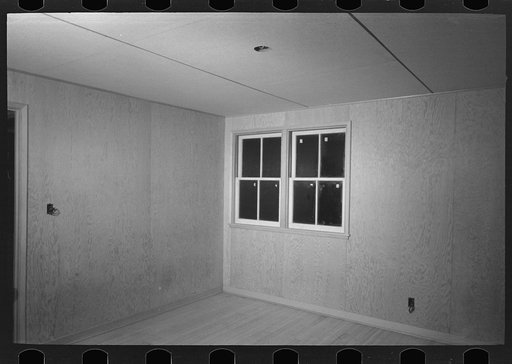 Untitled photo, possibly related to: Bedroom in the model house at Greendale, Wisconsin