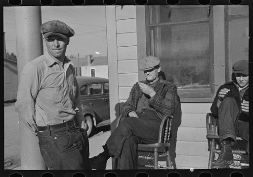 Lumberjacks in front of the Durman Hotel, Little Fork, Minnesota