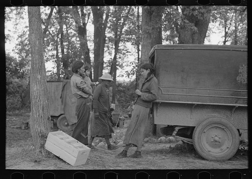 Blueberry pickers getting ready to go into the fields, near Little Fork, Minnesoat