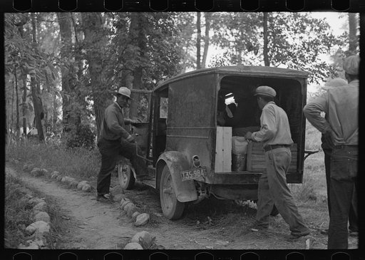 Untitled photo, possibly related to: Blueberry pickers preparing to go to the fields near Little Fork, Minnesota