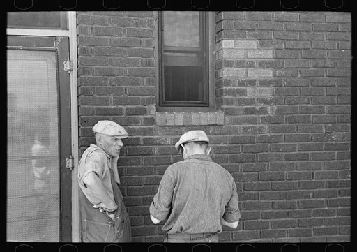 Untitled photo, possibly related to: Two unemployed men, Gateway District, Minneapolis, Minnesota