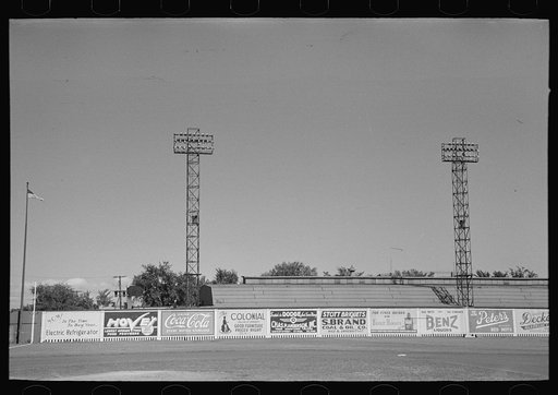 Signs and lighting standards at baseball park, Saint Paul, Minnesota